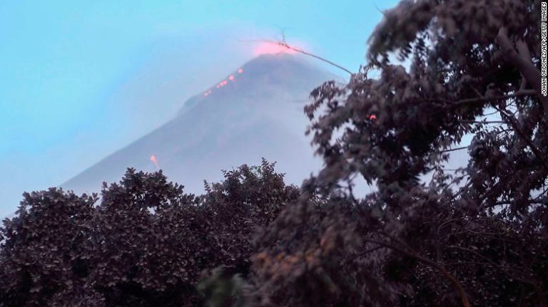 Guatemalans struggle to recover the dead buried by volcano eruption