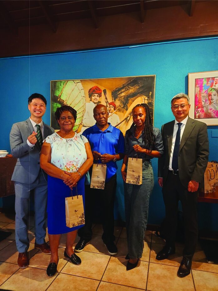 Taiwan Embassy officials and Labour Spokesman staff at a media luncheon in Frigate Bay