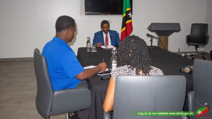 drew and members of the press