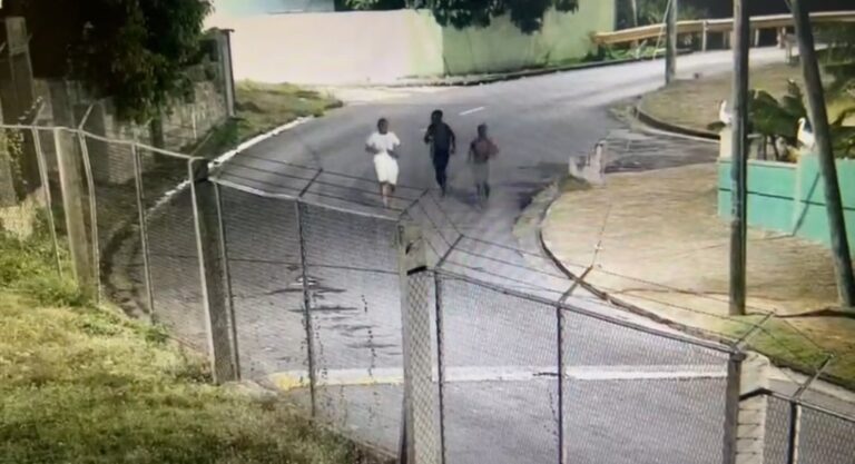 Image: Screenshot image shows three juvenile males running as captured in surveillance footage, after allegedly being involved in malicious damage relating to multiple incidences of malicious damage to passing vehicles on the F. T. Williams Highway between July 10, 2023 and July 21, 2023 (Credit: Facebook/The Royal St.Christopher and Nevis Police Force)